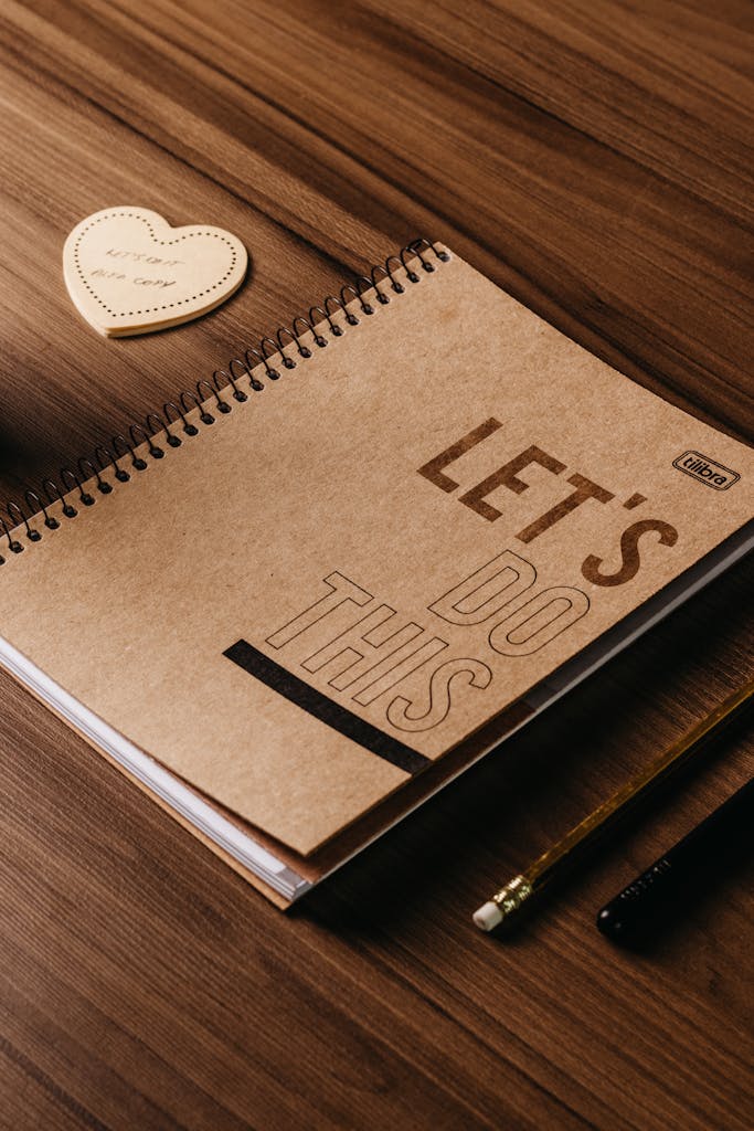 Notebook with the words Let's Do This representing self advocacy, personal growth, and confidence