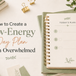Low-energy day plan featured image with a planner, soft green accents, and calm workspace styling